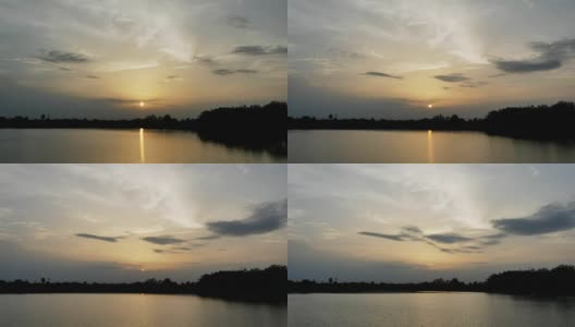 日落时，绚丽多彩的天空和云彩的时间流逝高清在线视频素材下载