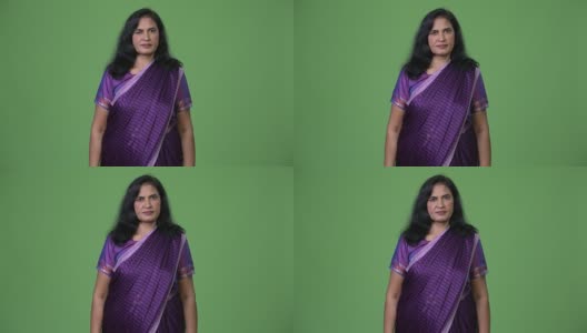 成熟美丽的印度女人穿着传统的纱丽衣服高清在线视频素材下载