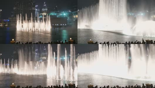 迪拜市中心哈利法塔和迪拜购物中心附近的跳舞喷泉高清在线视频素材下载