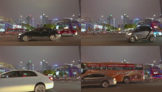汽车在镜头前分散开来，背景是广州的摩天大楼。大城市的夜生活高清在线视频素材下载