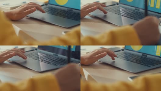 年轻的自由平面设计亚洲女性使用笔记本电脑和绘图平板电脑在客厅的家。高清在线视频素材下载