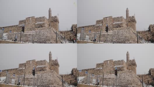 在冬天，从较低的道路上可以看到大卫塔和耶路撒冷旧城的城墙高清在线视频素材下载