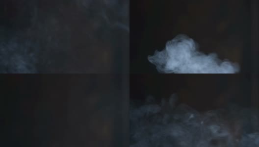 熏香的烟雾在黑暗的背景上翻腾高清在线视频素材下载