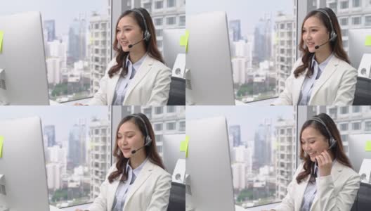 亚洲女商人在呼叫中心城市办公室通过耳机交谈高清在线视频素材下载