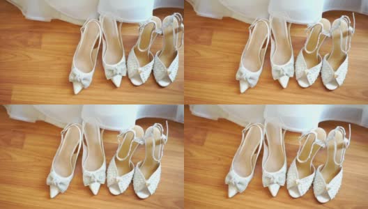白色的婚礼鞋在木地板上。高清在线视频素材下载
