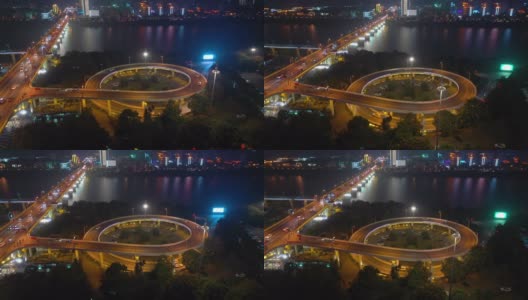 夜景照亮长沙市市中心滨江交通大桥道路交汇处4k中国航拍全景高清在线视频素材下载