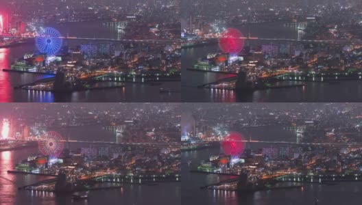 4K延时:大阪湾在美丽的夜晚与游乐园在美丽的日本，缩小高清在线视频素材下载