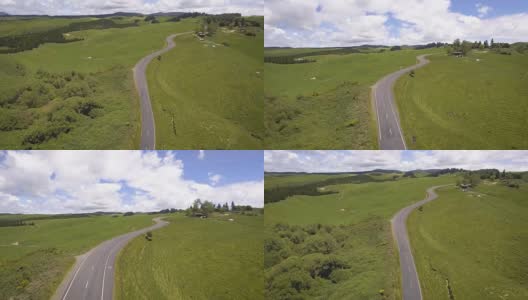 公路旅行在绿色草地在罗托鲁瓦，新西兰从空中看高清在线视频素材下载