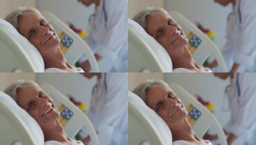一个快乐的退休老人躺在医院的病床上高清在线视频素材下载