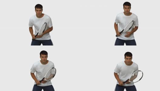 英俊的男子训练，同时打网球在白屏幕上高清在线视频素材下载