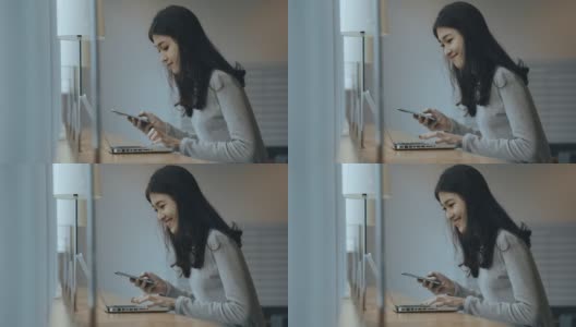 亚洲女学生在图书馆使用笔记本电脑高清在线视频素材下载