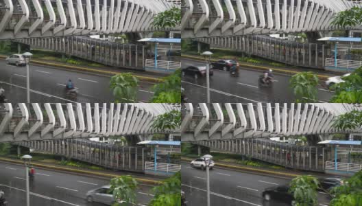 下雨天雅加达市区著名的人行天桥交通街道慢镜头全景4k印尼高清在线视频素材下载