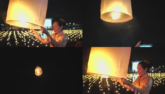 美丽的女人与朋友在Loi Krathong (Yi Peng或Yee Peng)节，泰国清迈。高清在线视频素材下载