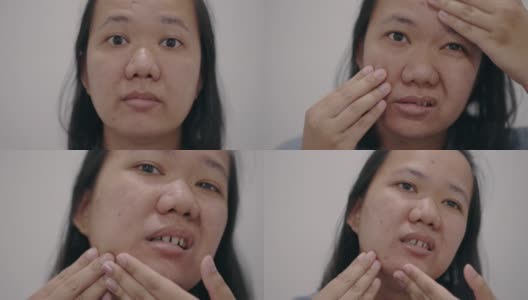 亚洲女人看和检查她的脸的正面视图高清在线视频素材下载