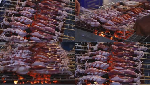 烤鱿鱼烤架上美味的烧烤海鲜高清在线视频素材下载