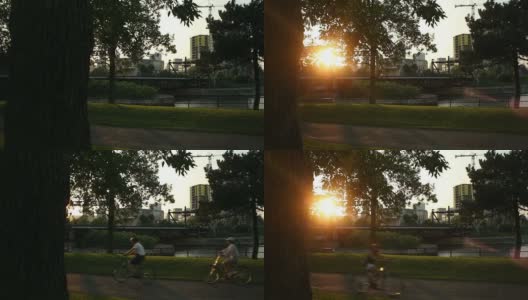 骑自行车在日落时分高清在线视频素材下载