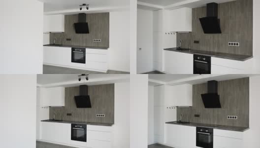 镜头正在移动的一间新装修的厨房里的现代公寓，设计新潮高清在线视频素材下载