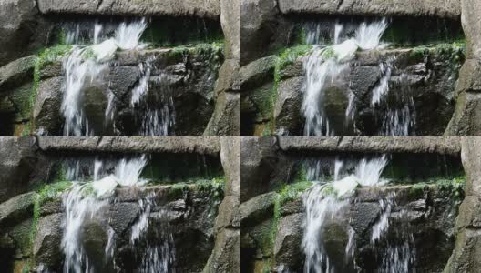 花园小瀑布用石头。高清在线视频素材下载