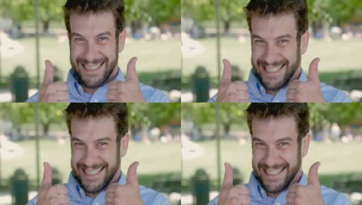 30多岁的快乐男人在户外竖起大拇指微笑高清在线视频素材下载
