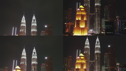 4k无人机夜景马来西亚吉隆坡市双子星塔高清在线视频素材下载