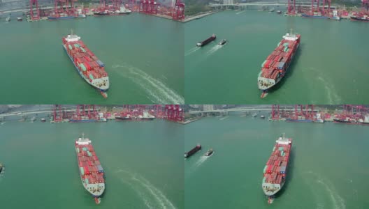 鸟瞰图集装箱货轮在码头商埠整箱集装箱向海上移动的业务物流，进出口，海运或运输高清在线视频素材下载