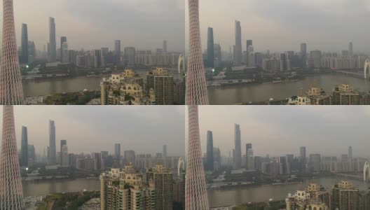 日落时分的照明广州市景市中心著名的塔顶航拍全景4k中国高清在线视频素材下载
