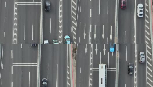 公路鸟瞰图与汽车期间在车道。中国上海的城市景观高清在线视频素材下载