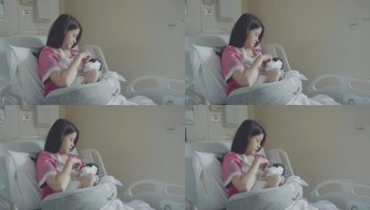 母亲和刚出生的婴儿在医院。高清在线视频素材下载