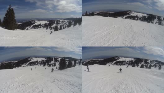在粉状雪中滑雪的人高清在线视频素材下载