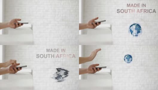 手发射地球全息图和南非制造文字高清在线视频素材下载