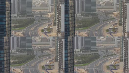 迪拜商业湾塔在白天的空中时间推移高清在线视频素材下载