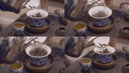 滚烫的水倒入漂亮的瓷碗中高清在线视频素材下载