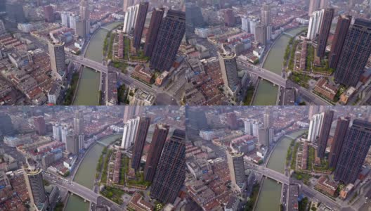 中国上海市区黄浦江的鸟瞰图。亚洲智慧城市的金融区和商业中心。日落时摩天大楼和高层办公大楼的顶视图。高清在线视频素材下载
