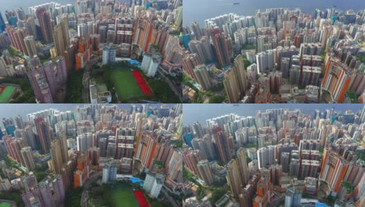 空中俯瞰香港市中心，。亚洲智慧城市的金融区和商业中心。摩天大楼和高耸的现代建筑在中午。高清在线视频素材下载