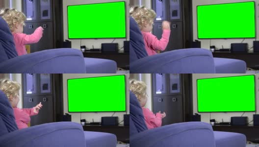 情绪激动的女孩子看着绿屏色度键电视高清在线视频素材下载