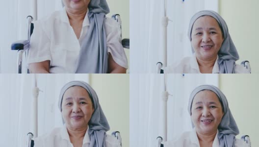 一位患有癌症的老年妇女在住院期间坐在轮椅上。高清在线视频素材下载