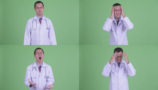 工作室肖像悲伤的亚洲人医生在绿色背景高清在线视频素材下载
