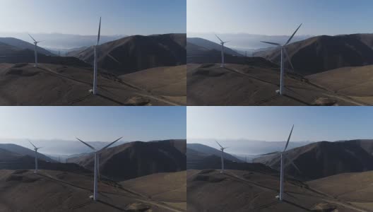 背景是风力发电机创造可再生能源发电厂冷却塔高清在线视频素材下载