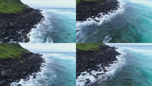 岩石海滩和海浪的鸟瞰图高清在线视频素材下载
