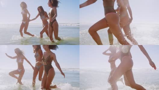 在海滩度假的女人跑过海浪的慢动作镜头高清在线视频素材下载