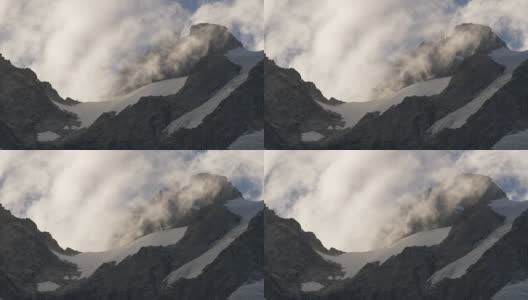 山脉上快速移动的云。勃朗峰地块高清在线视频素材下载