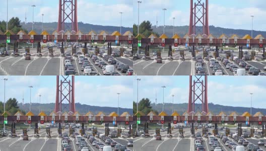 汽车经过收费高速公路点，收费站靠近大桥。葡萄牙里斯本高清在线视频素材下载