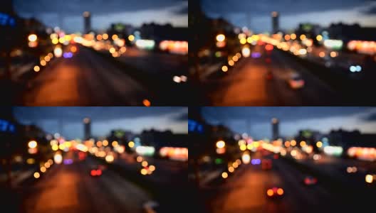 摘要模糊车灯为傍晚时分的道路交通提供了便利高清在线视频素材下载