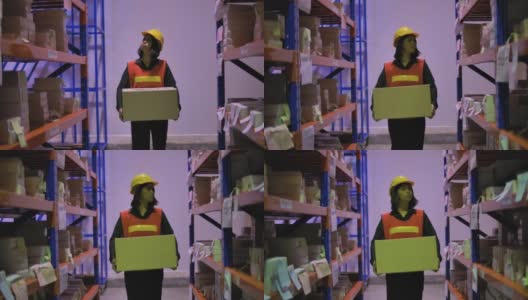 女员工在仓库物流中手持箱子和行走检查库存产品。高清在线视频素材下载