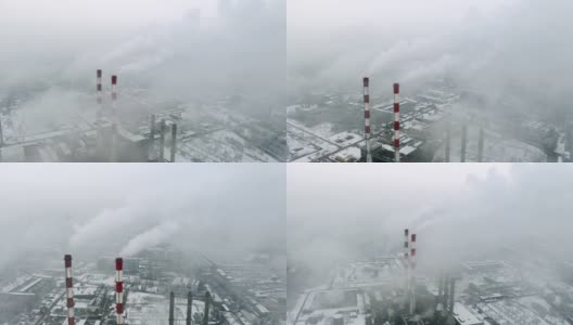 冬季多雾的火电厂烟囱高清在线视频素材下载