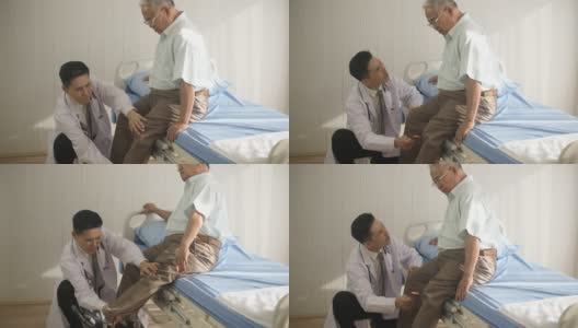 理疗医生在医院测试病人的膝盖反射并进行锻炼高清在线视频素材下载