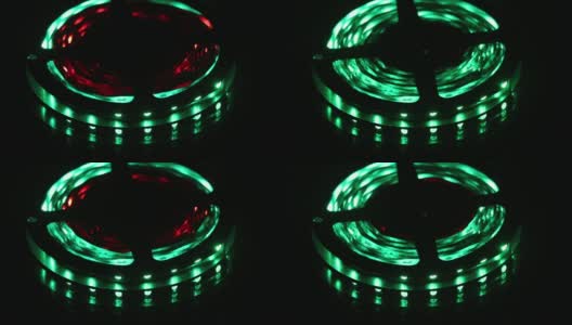绿光被填充在led灯条中。智能LED与变化的颜色高清在线视频素材下载