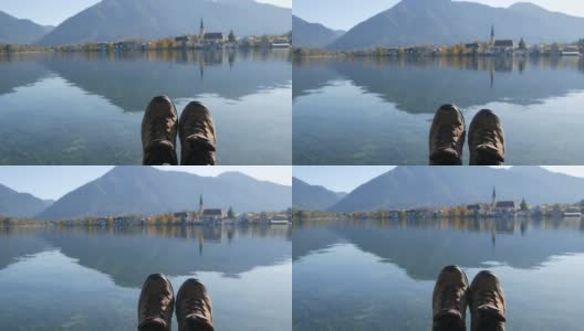 秋天的德国巴伐利亚，在泰根西湖乘船旅行。游客们站在前台。徒步旅行的女人靴子近距离。旅游理念繁荣幸福快乐高清在线视频素材下载