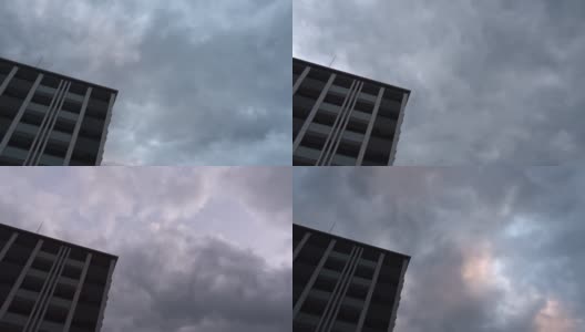 云在建筑物后面流动高清在线视频素材下载
