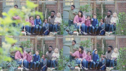 朋友和家人在社区花园高清在线视频素材下载